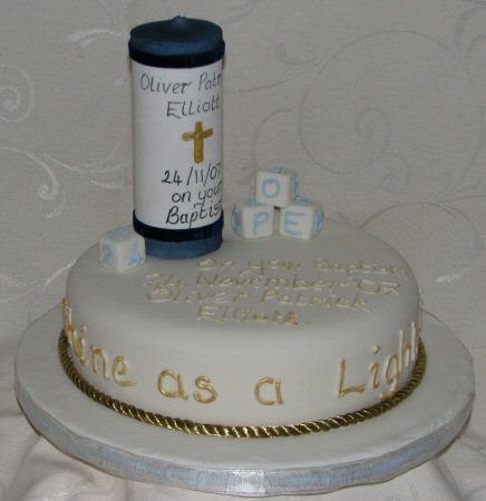 baptism cake with candle